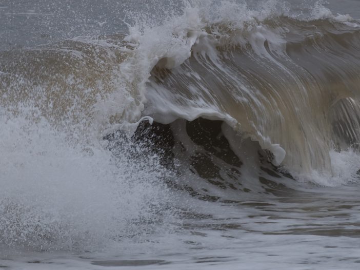 wave at its journey's end